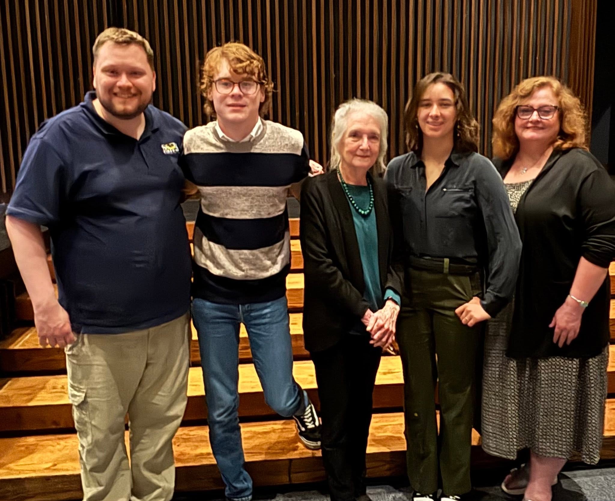 JP Budlong and Victoria Izarra pose with Dominique Avery and SCM staff.